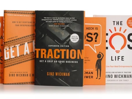 A selection of books from the EOS library, including Traction